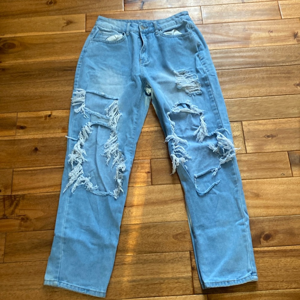 Distressed Light Blue Jeans